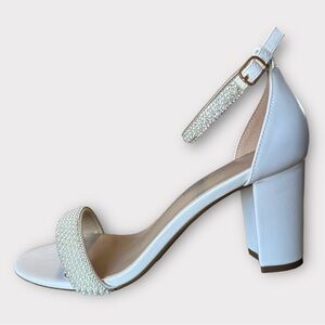 Beautiful bridal heels with pearls and rhinestones